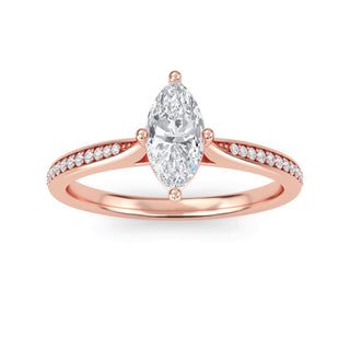 Anillo de compromiso con piedra lateral cónica de talla marquesa de 0,5 ct.
