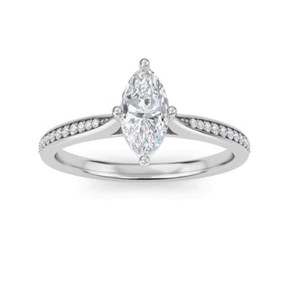 Anillo de compromiso con piedra lateral cónica de talla marquesa de 0,5 ct.
