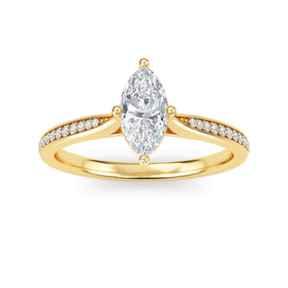 Anillo de compromiso con piedra lateral cónica de talla marquesa de 0,5 ct.