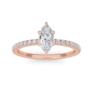 Anillo de compromiso clásico con piedra lateral de talla marquesa de 0,5 ct.
