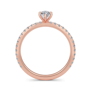 Anillo de compromiso clásico con piedra lateral de talla marquesa de 0,5 ct.