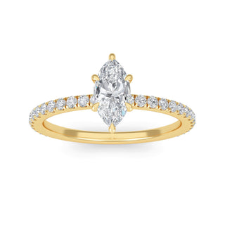 Anillo de compromiso clásico con piedra lateral de talla marquesa de 0,5 ct.