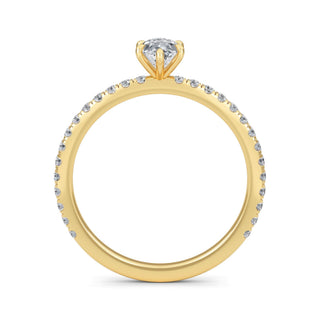 Anillo de compromiso clásico con piedra lateral de talla marquesa de 0,5 ct.